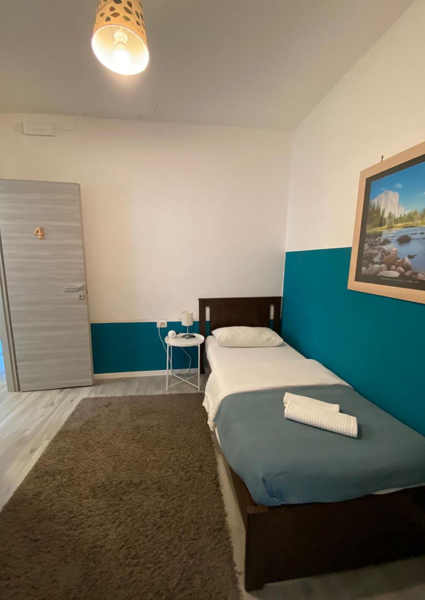 Maison Sarraj Parma Pokoj fotografie