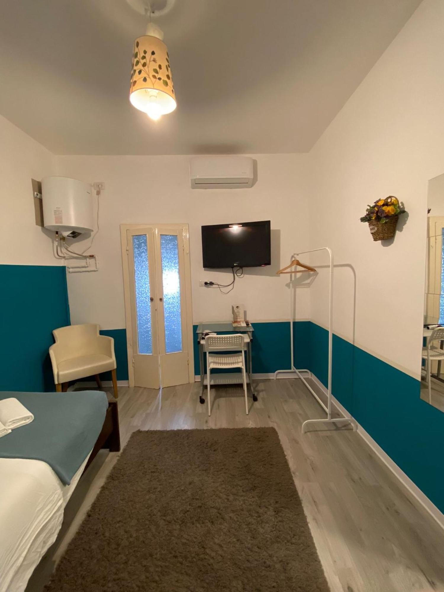Maison Sarraj Parma Pokoj fotografie